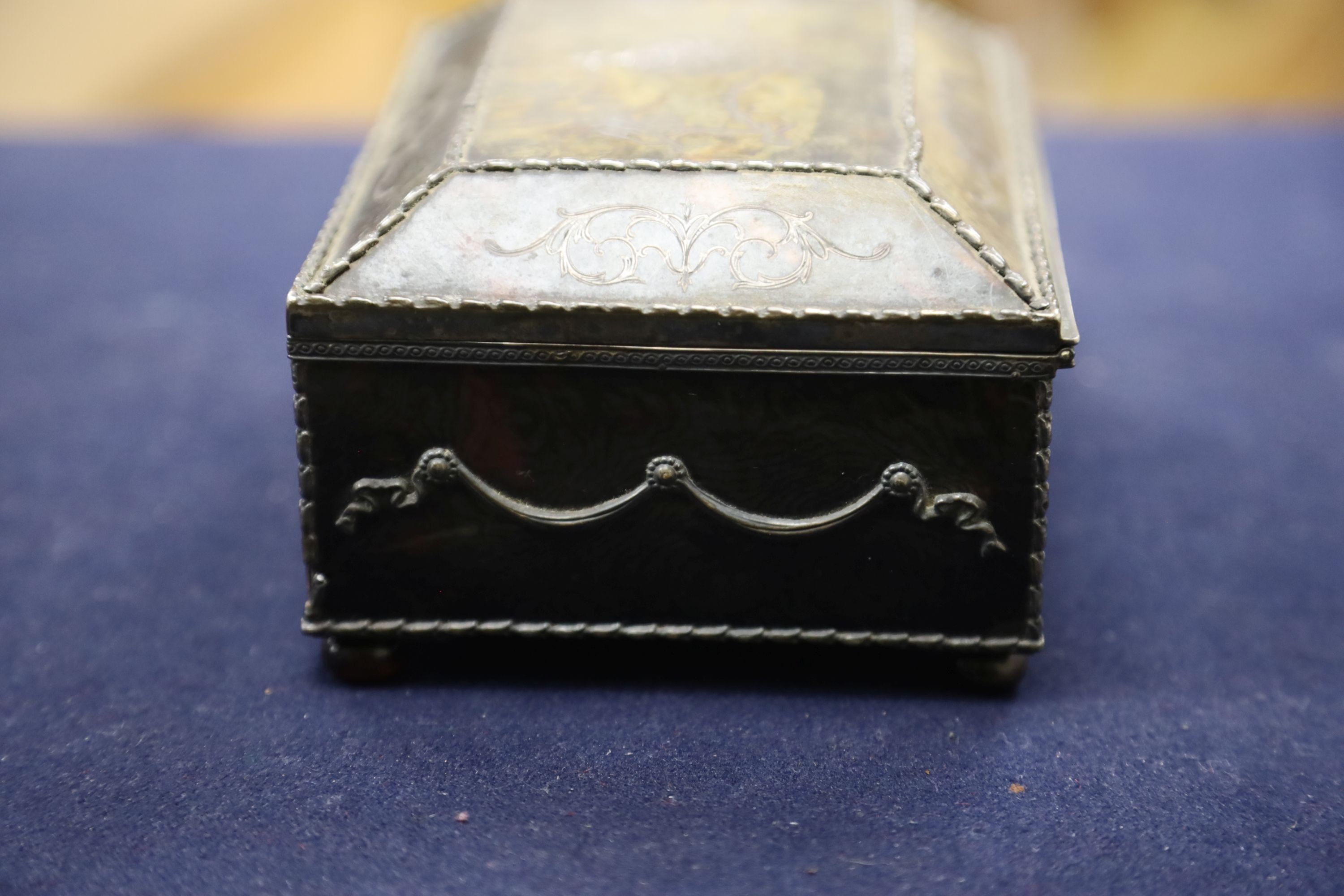 A silver-mounted tortoiseshell pique rectangular trinket box, by William Comyns, raised on four ball feet, London, 1904, width 15cm. 15cm